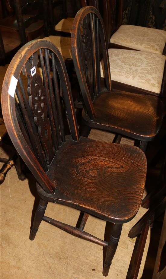 2 wheel back chairs